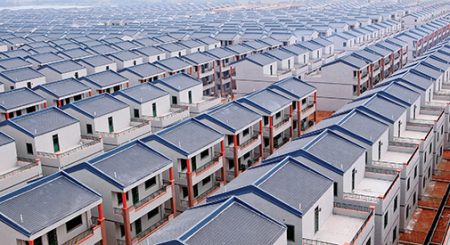 A general view of newly-built houses at Dadun village of Lingshui ethnic Li autonomous county